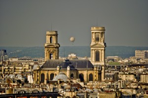 Hot air balloon caught between the towers of St.  Germain-des-Pres