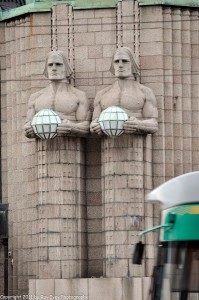 Monumental figures carved into the facade of the main train station.